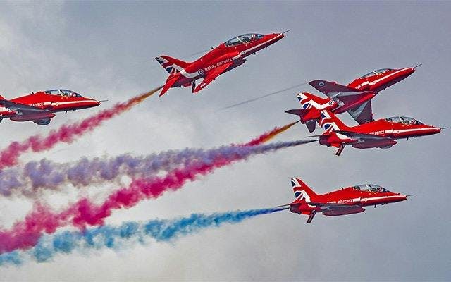 The Red Arrows fly over